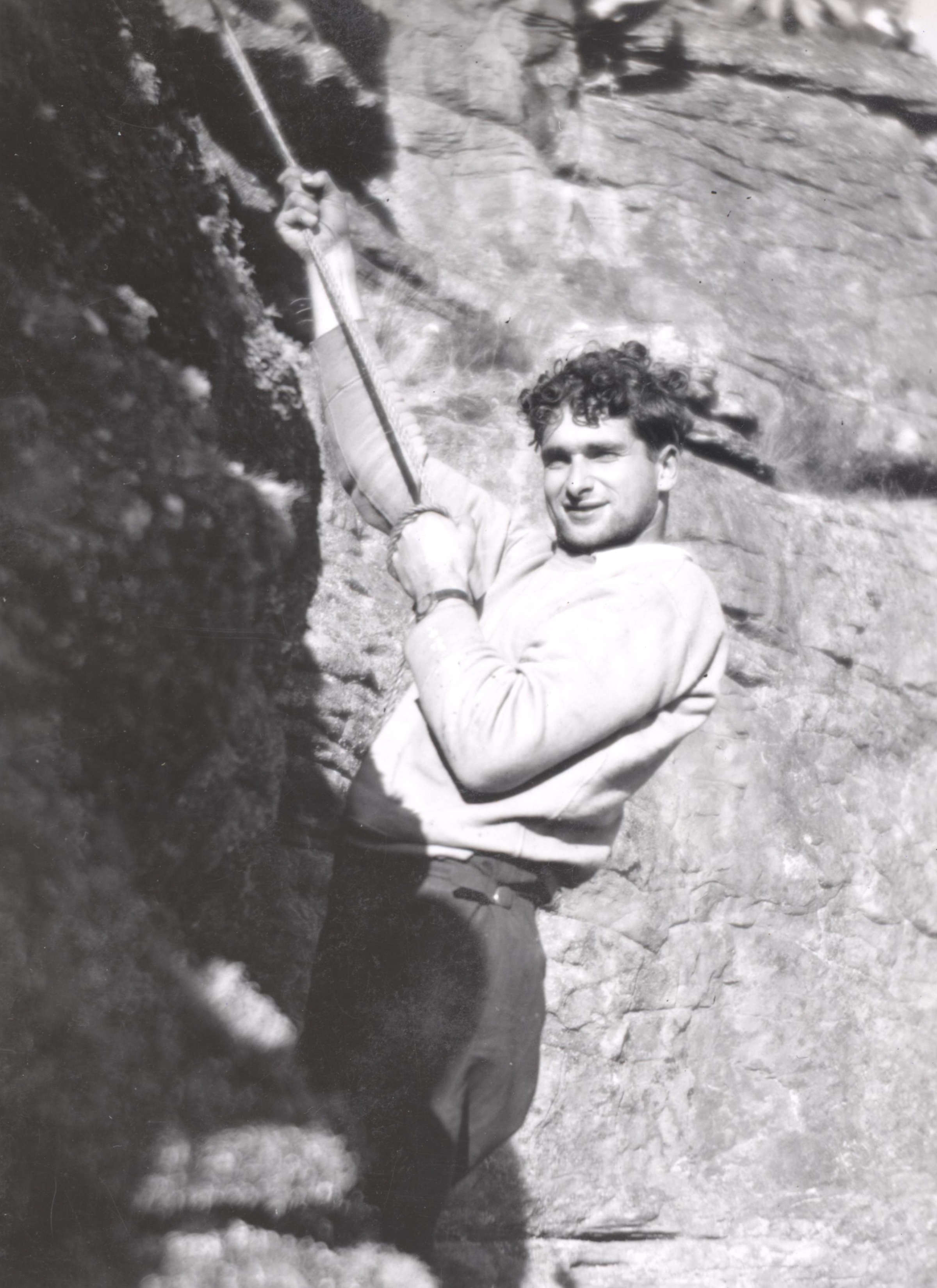 Teacher G Jones attempting Brown’s Cave, 1947.