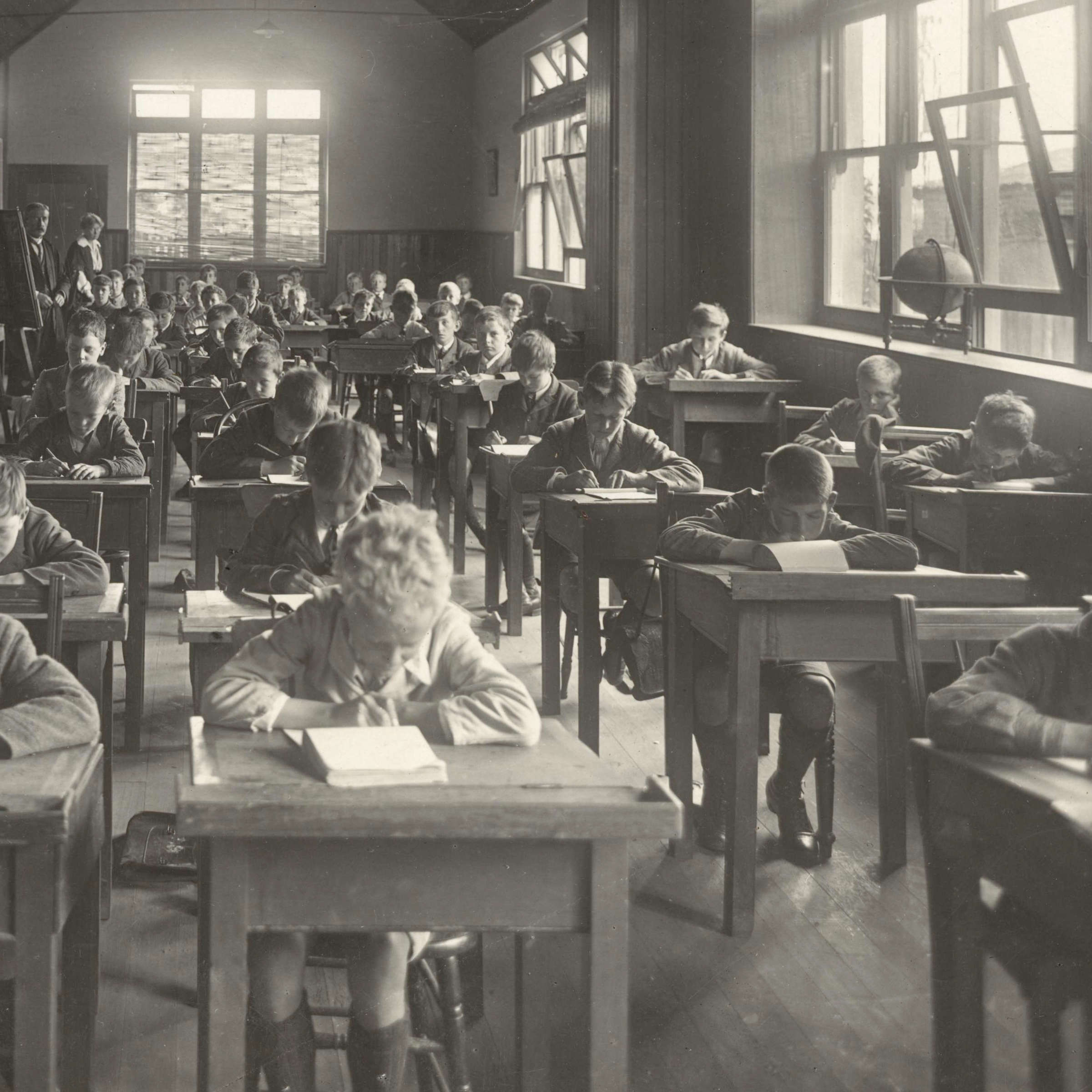 Junior School classroom with W F Tennant and Miss E M Elliott, 1919.