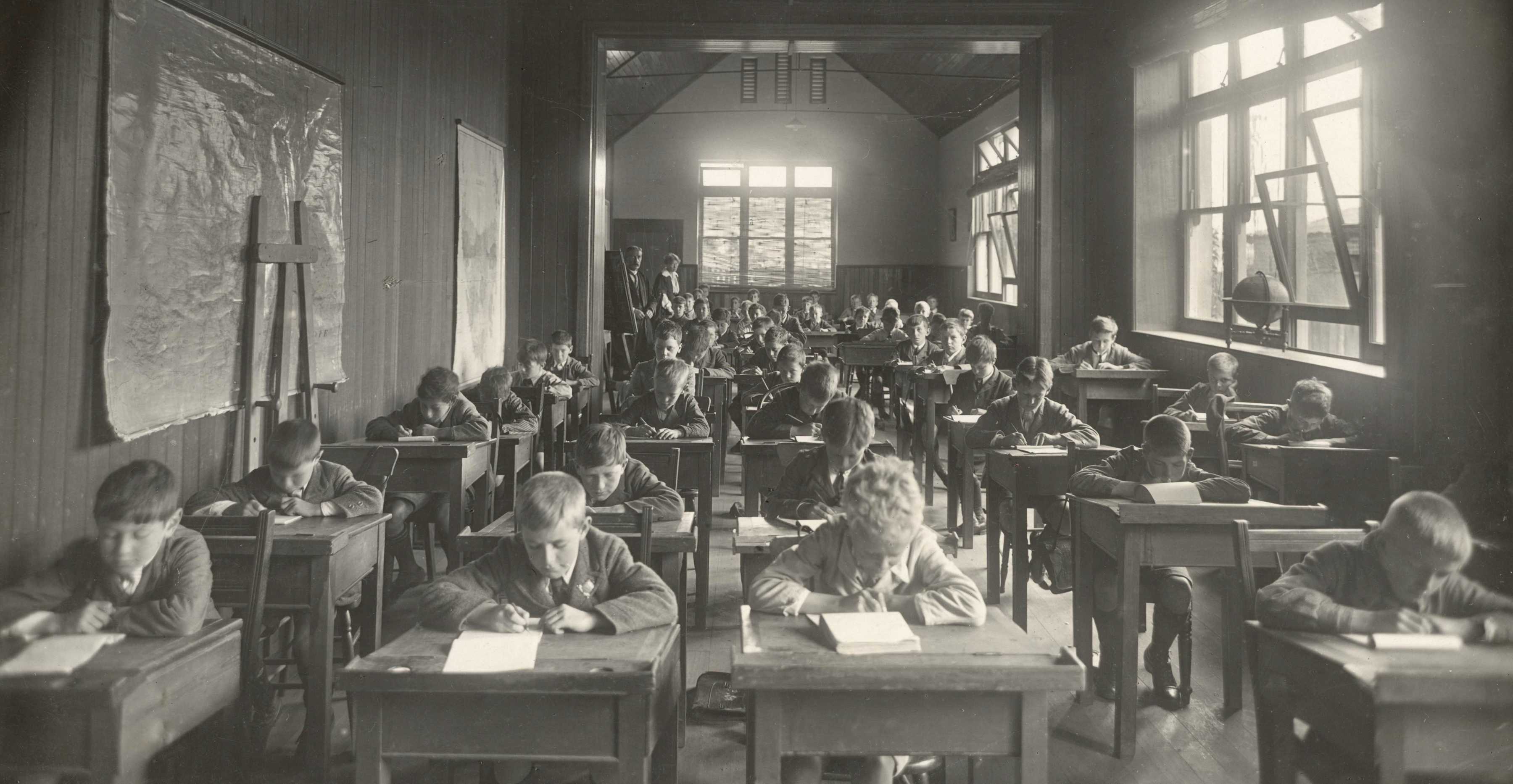 Junior School classroom with W F Tennant and Miss E M Elliott, 1919.
