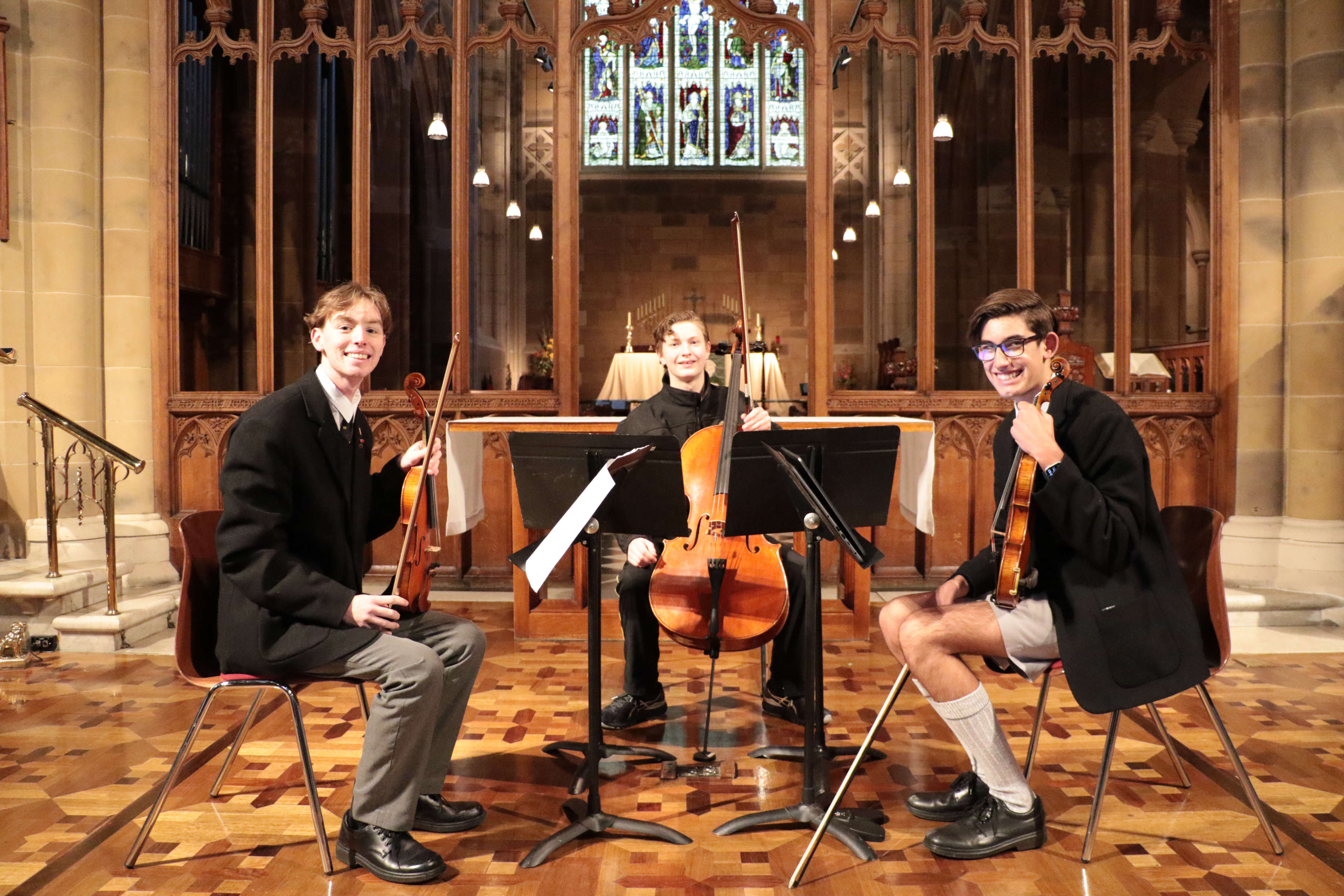 Hutchins Strings Trio perform during a lunchtime concert at St David’s Cathedral. Photo: Laura Bird.