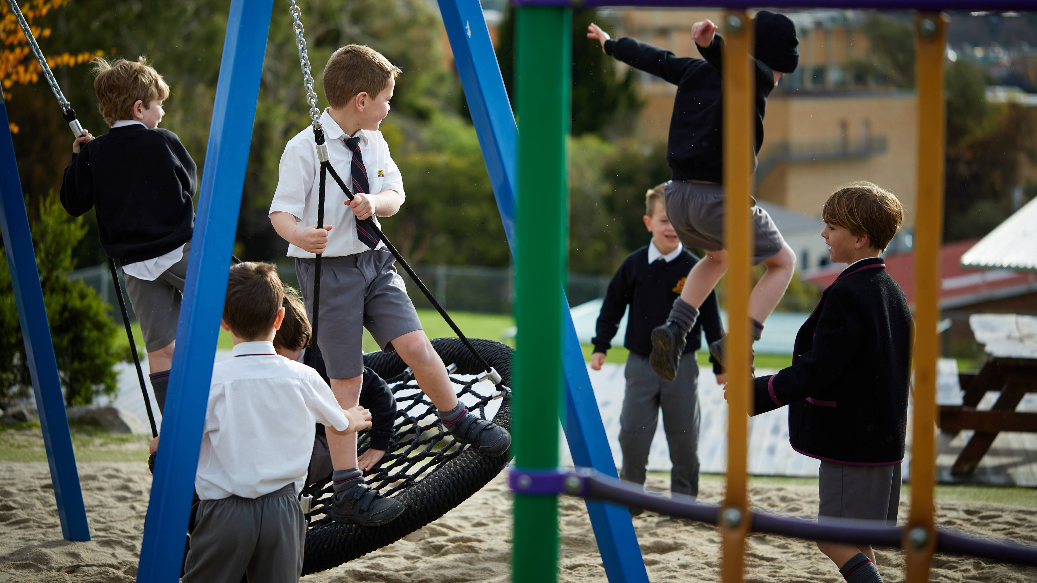 Junior School students on playground equipment. Photo: Joshua Lamont.