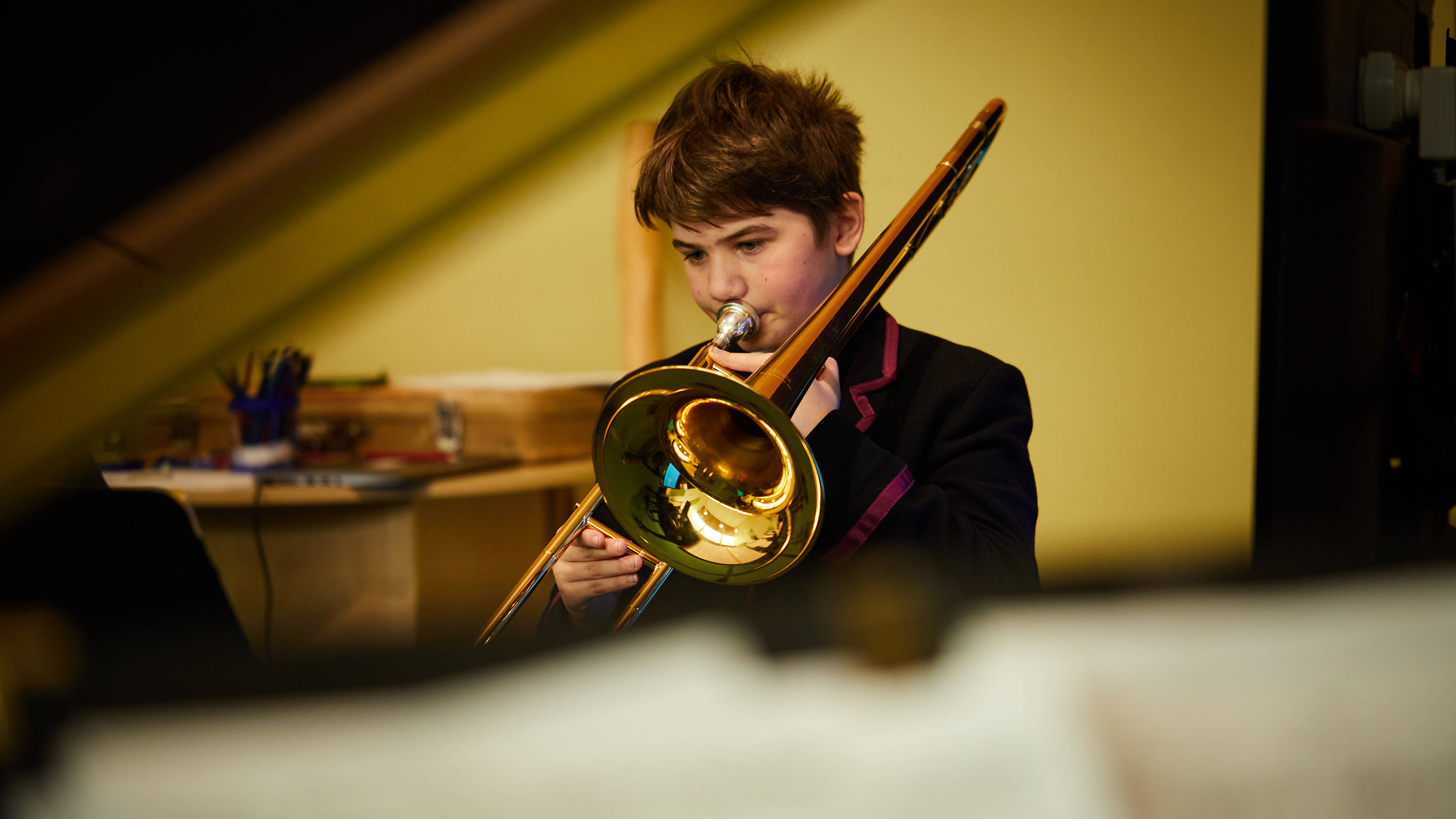 Junior School student playing the trombone. Photo: Joshua Lamont.